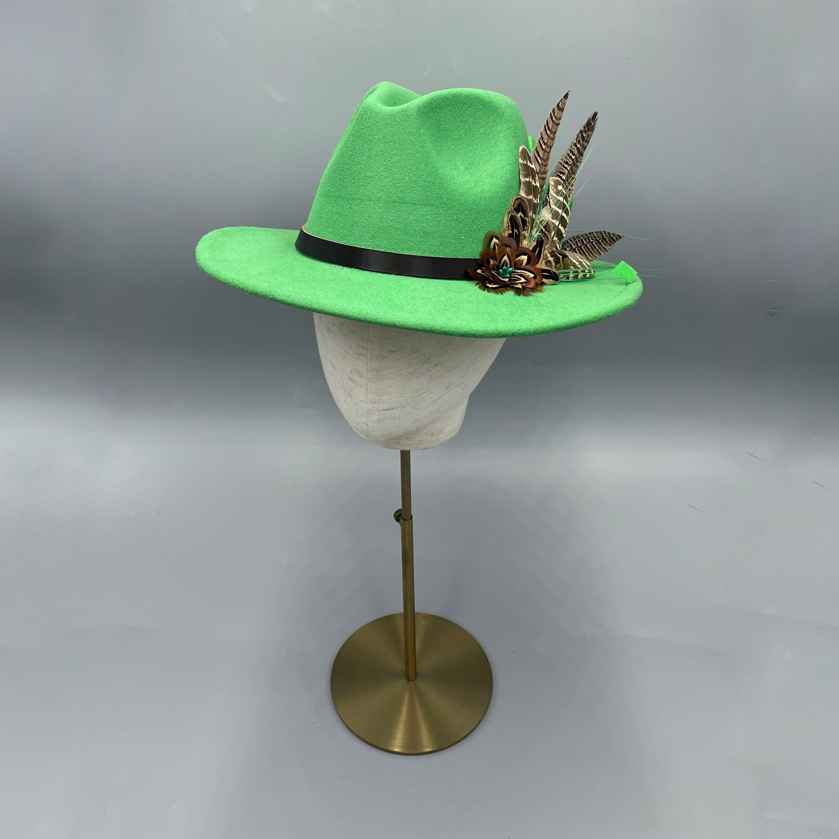 Emerald green fedora hat with pheasant feathers