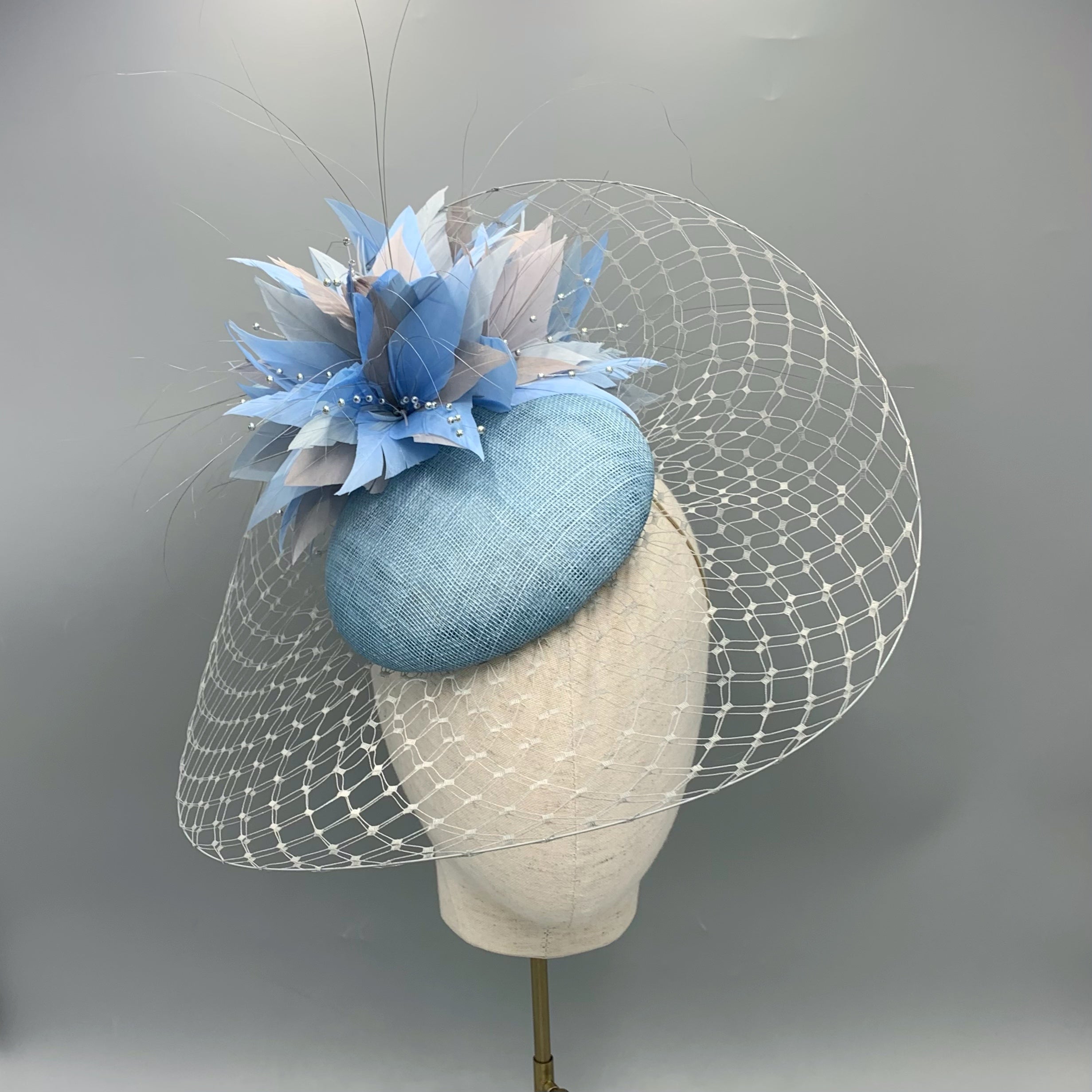light blue and grey fascinator hat