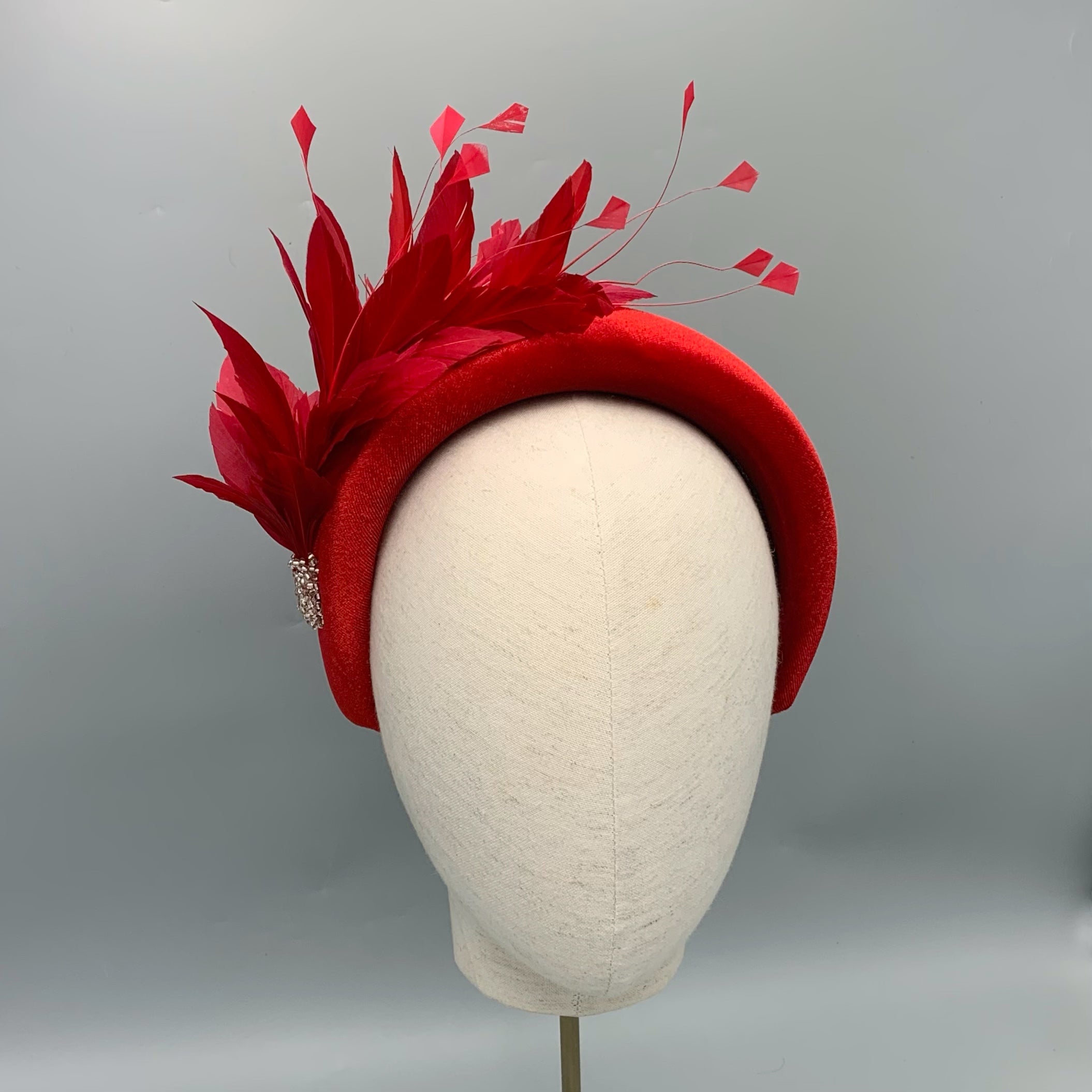 red padded fascinator 