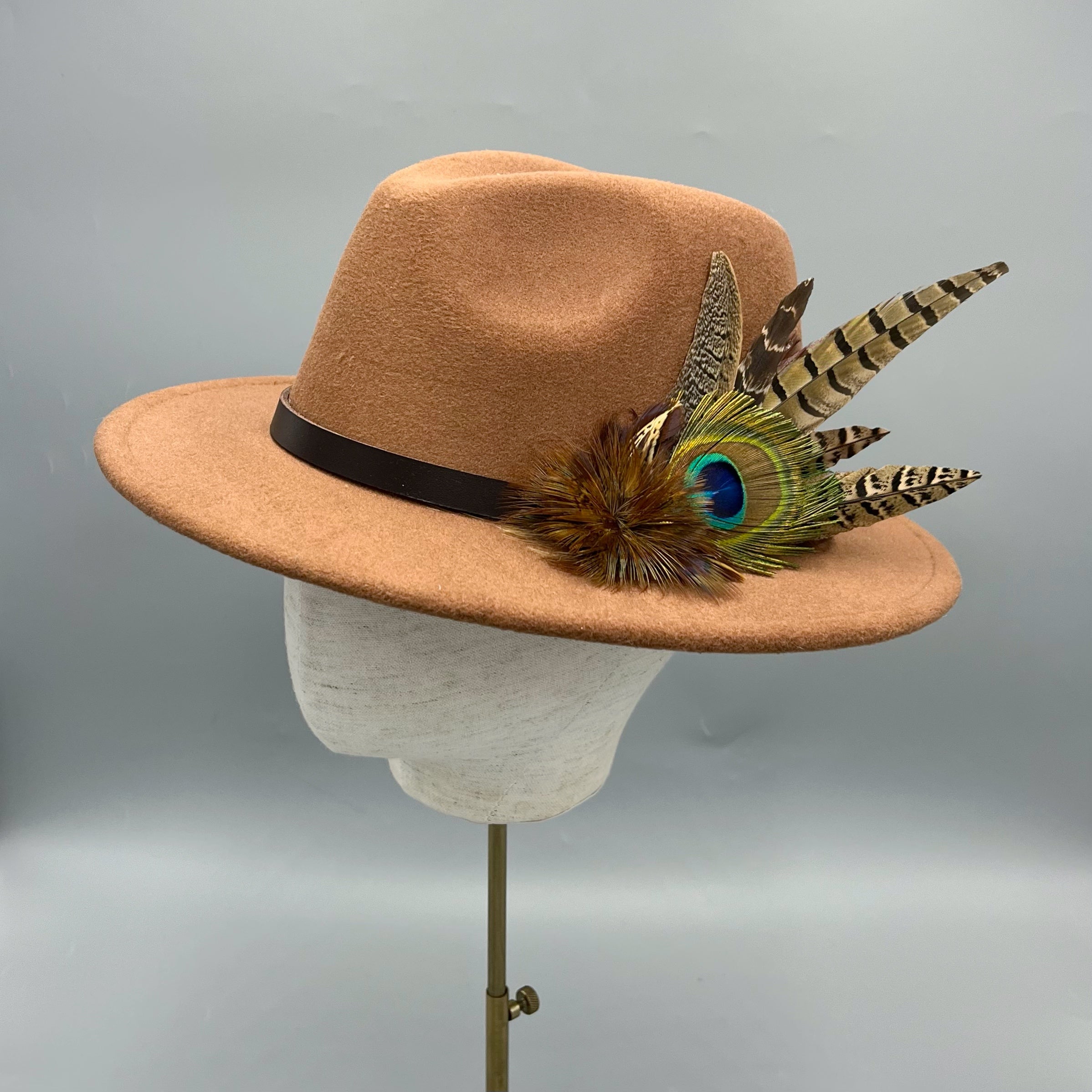 Tan fedora hand embellished with natural game bird feathers