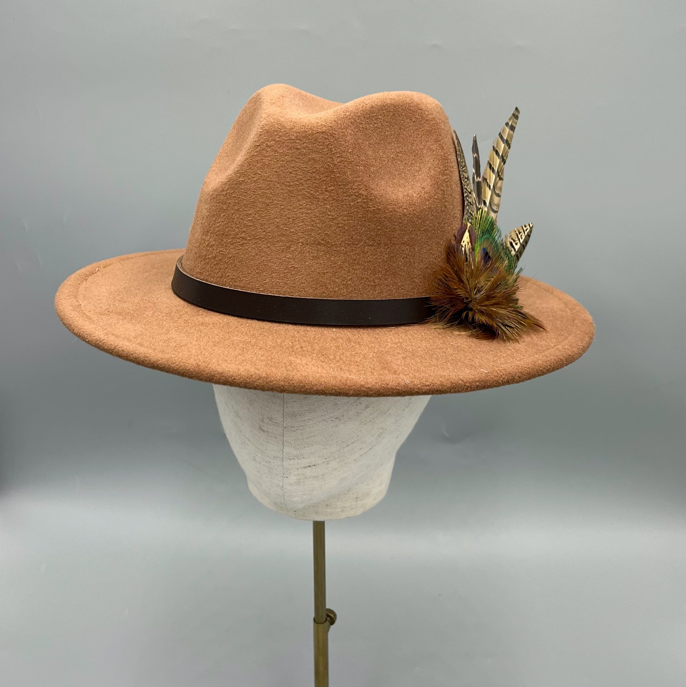 Tan fedora hand embellished with natural game bird feathers